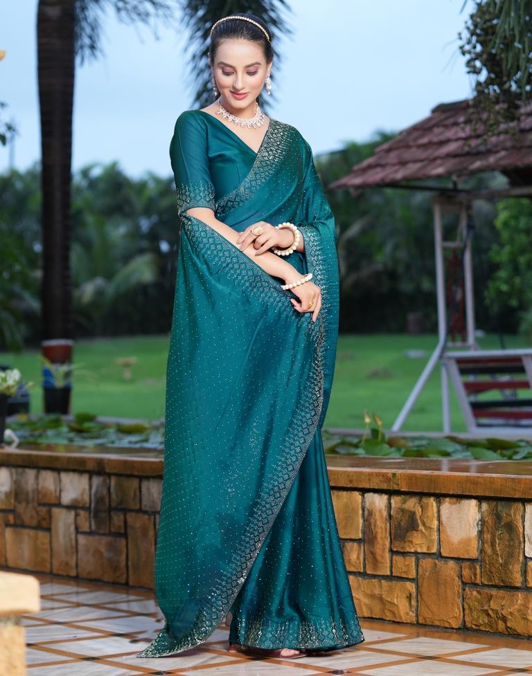 Cream and Teal color silk sarees with all over the body with gold and  silver zari