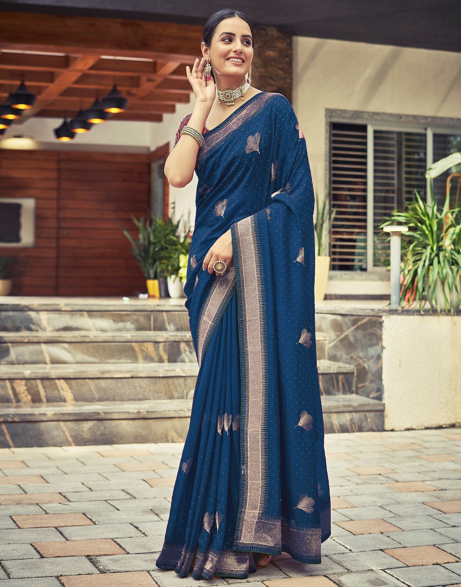 Light blue plain mysore silk saree features contrast zari border of  traditional designs & pallu of zari stripes