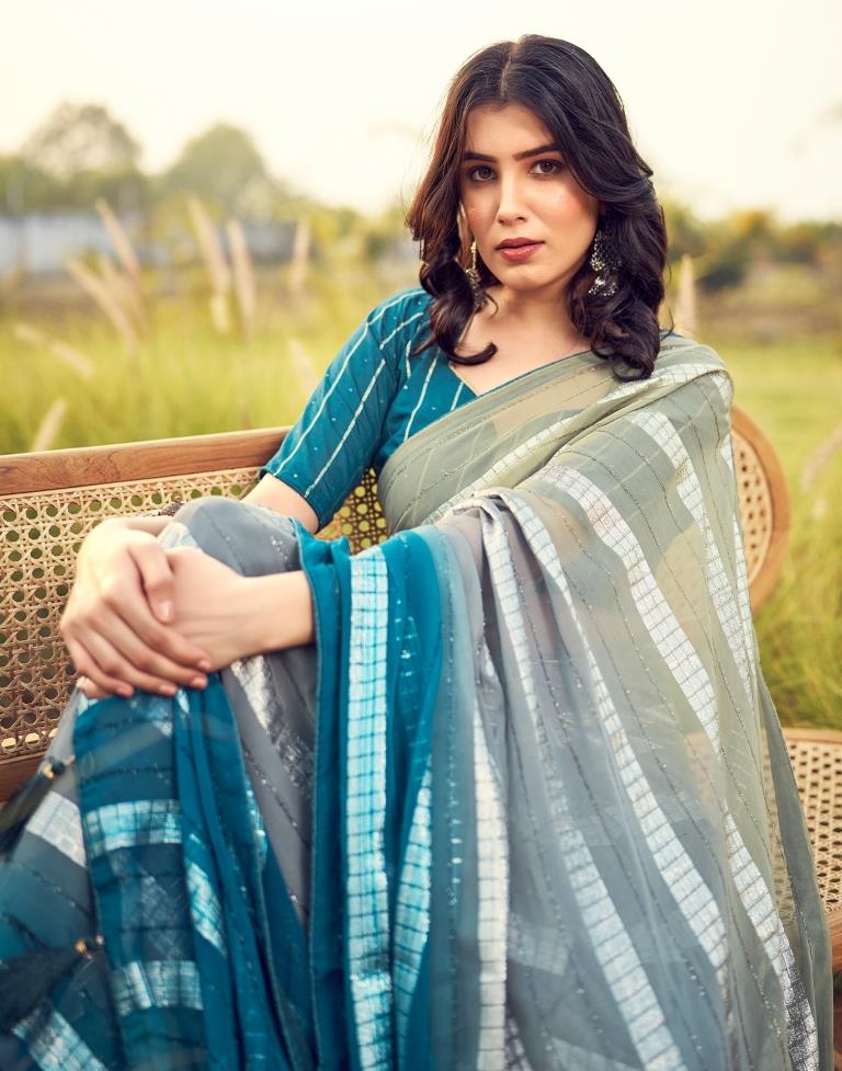 Teal Blue Georgette Plain Saree Leemboodi