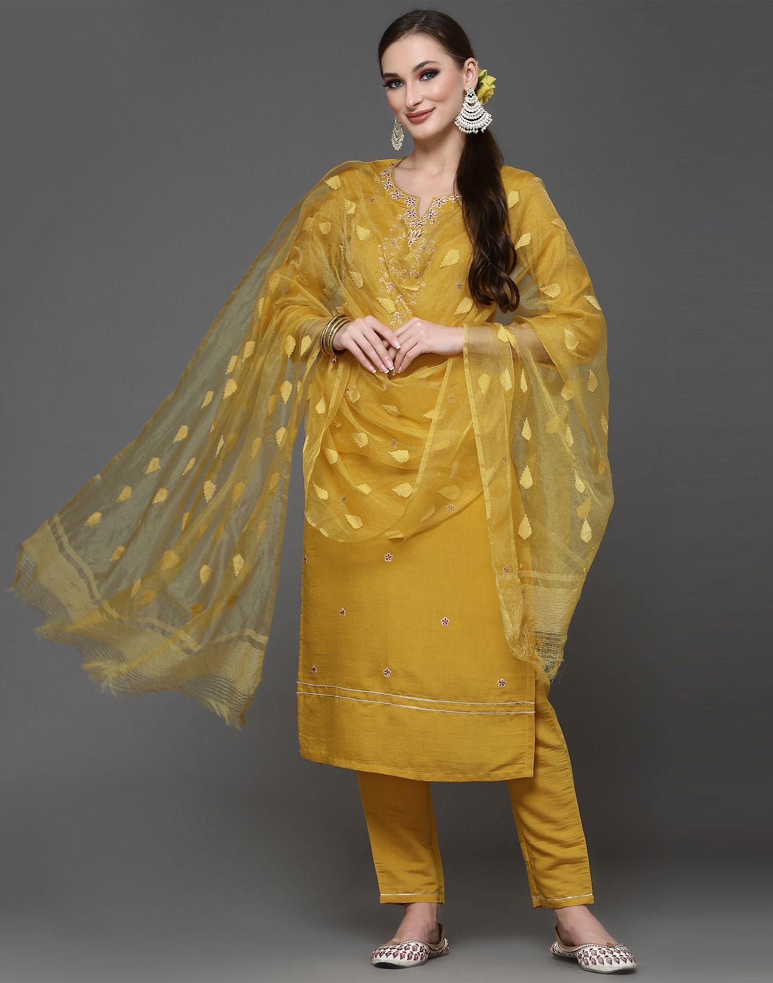 Sara Ali Khan shines in a whitegold kurta set outside a production house