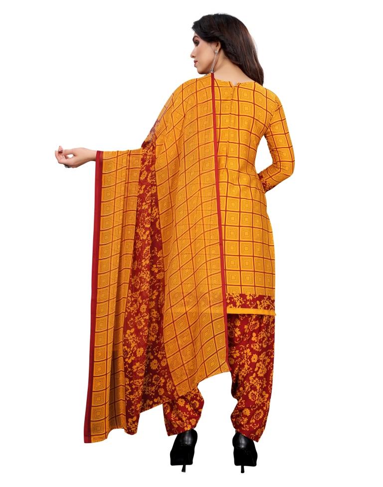 Outstanding Turmeric Yellow Printed Unstitched Salwar Suit | Leemboodi