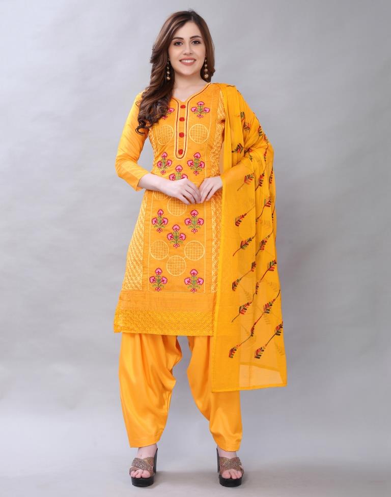 Alluring Turmeric Yellow Cotton Embroidered Unstitched Salwar Suit | Leemboodi