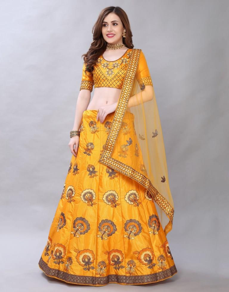 Beautiful Turmeric Yellow Coloured Satin Silk Embroidered Casual Wear Lehenga | Leemboodi