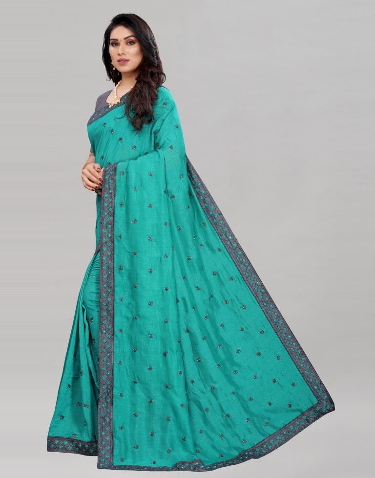 Pine Green Coloured Poly Silk Embroidered Partywear saree | Leemboodi