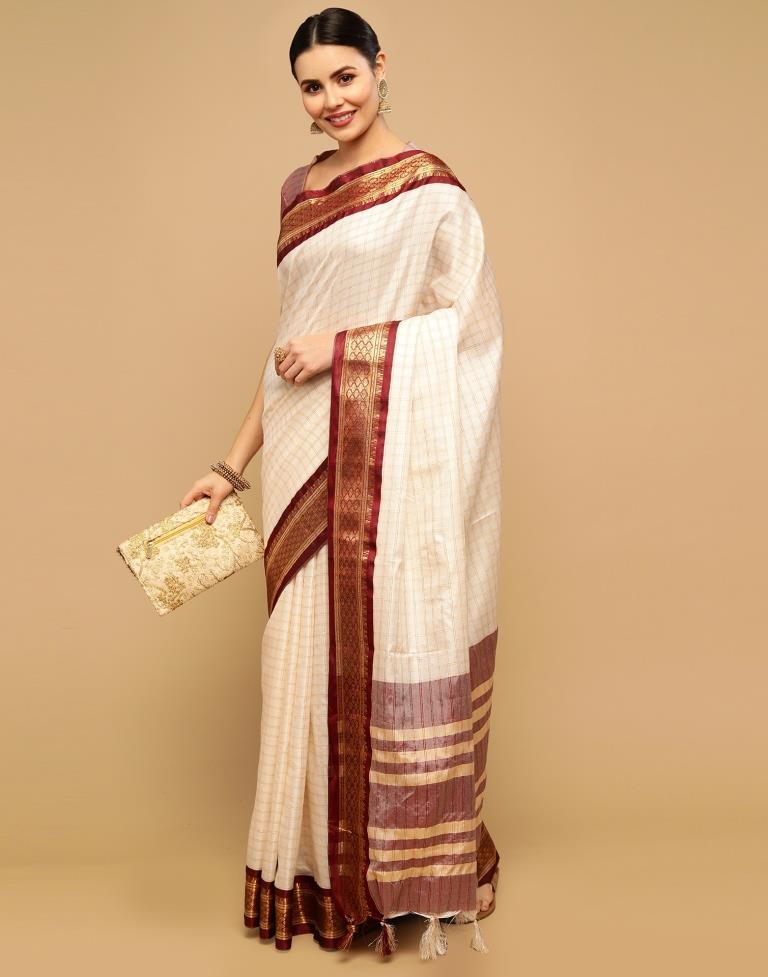 Off white silk outlet saree with golden border