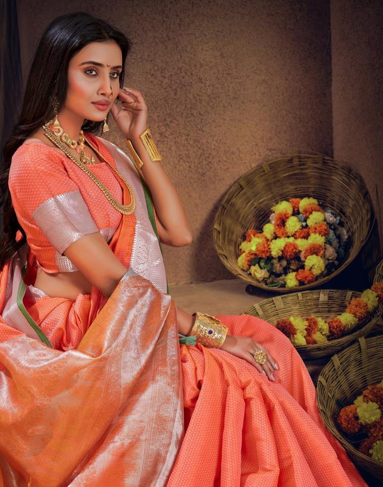 Peach color tussar silk saree with golden zari weaving work