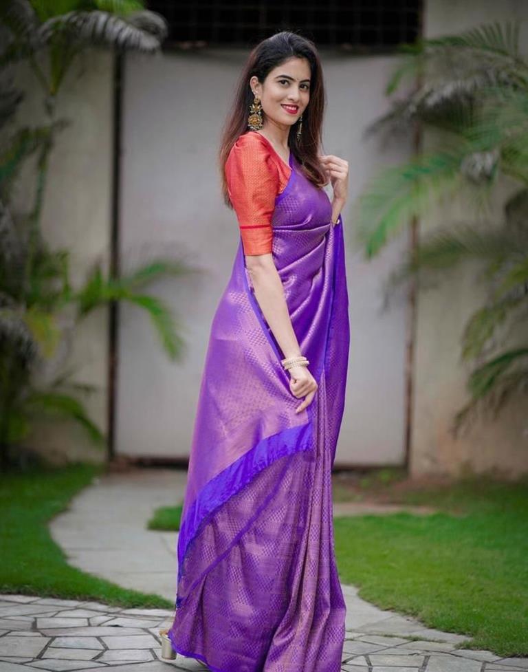 Cynosure Purple Kanjivaram Silk Saree With Inspiring Blouse